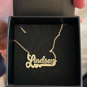 Nameplate necklace: Lindsey Never worn, still in the box.